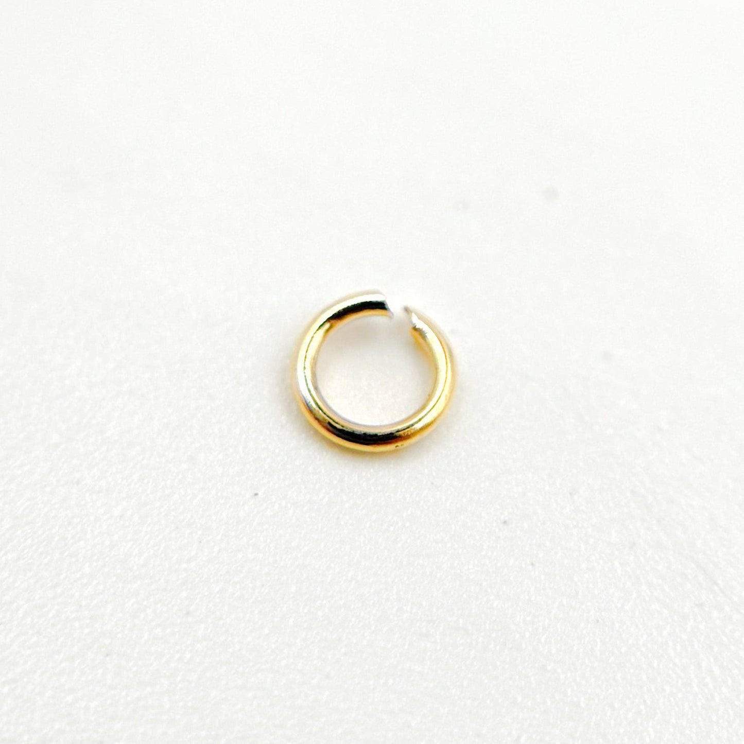 MFT050DE3GF. 24 Gauge Open Gold Filled Jump Ring: 50 Pcs. / 3mm / Open