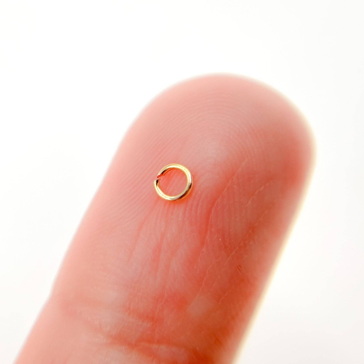 MFT050DE3GF. 24 Gauge Open Gold Filled Jump Ring: 50 Pcs. / 3mm / Open