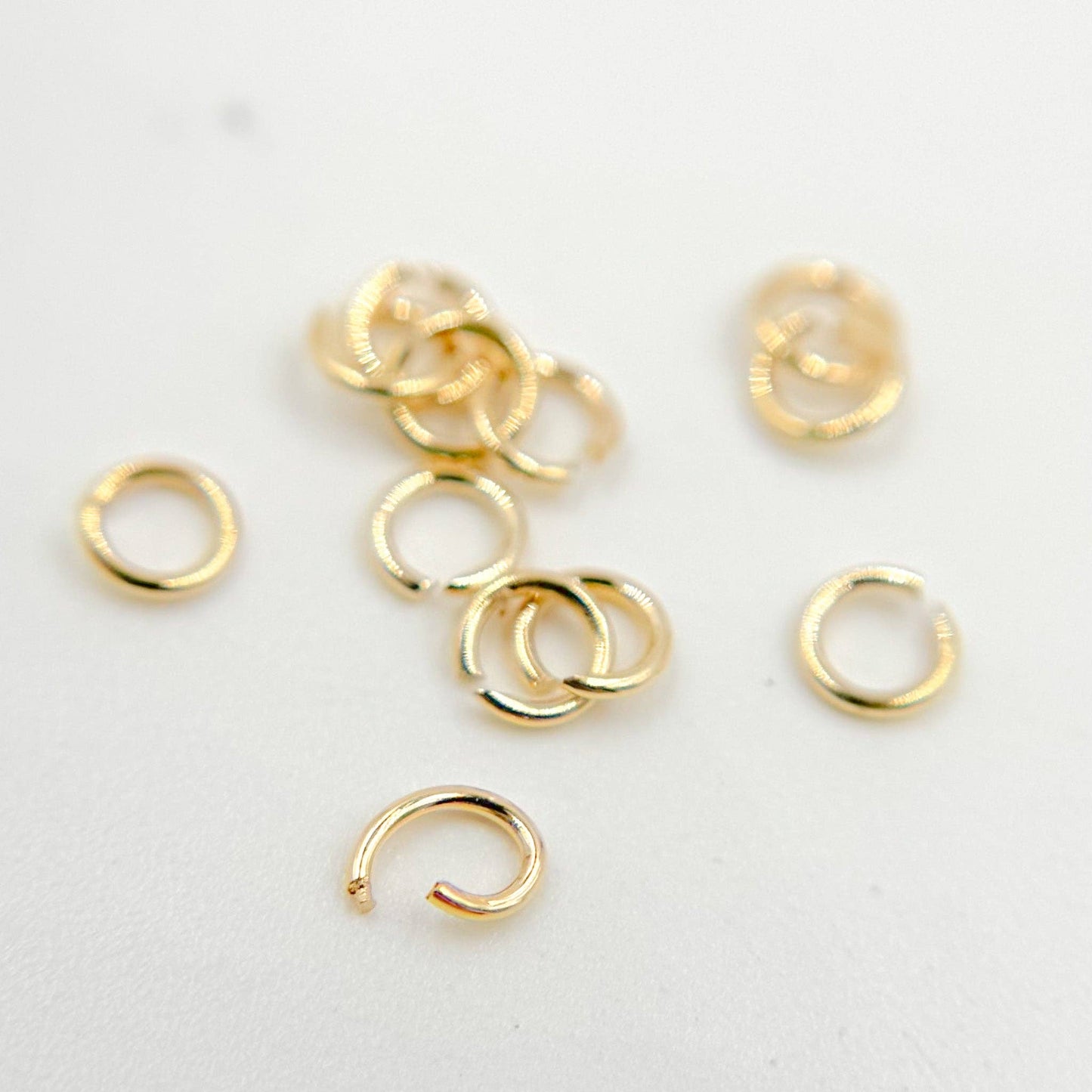 MFT050DE3GF. 24 Gauge Open Gold Filled Jump Ring: 50 Pcs. / 3mm / Open